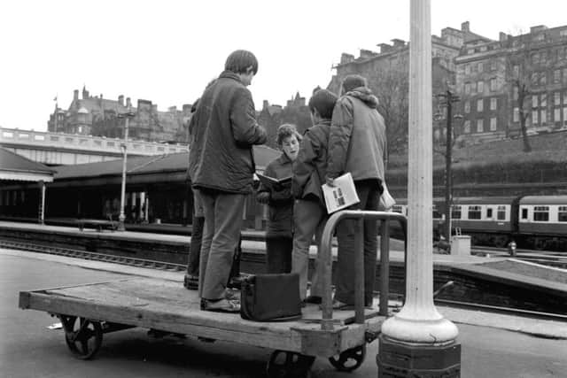 Trainspotters compare notes at Waverley Station in Edinburgh in November 1972