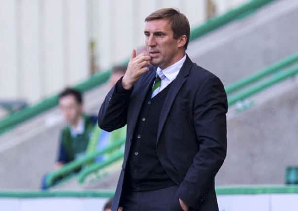 Alan Stubbs has assured Hibs fans that he is focused on guiding the club to promotion and the Scottish Cup. Pic: SNS