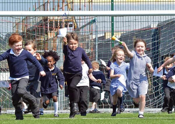 Kirkliston Primary pupils enjoy their new 3G pitch. Picture: Jon Savage