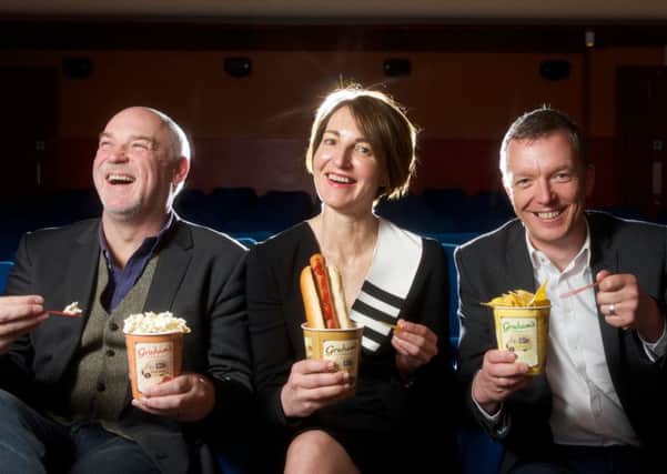 Edinburgh International Film Festival artistic director Mark Adams, Graham's marketing manager Carol Graham and Centre for the Moving Image Ken Hay prepare themselves for a new ice cream experience. Picture: Rob McDougall