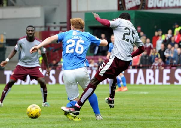 Abiola Dauda was sent off for this tackle on Liam Craig. Pic: SNS