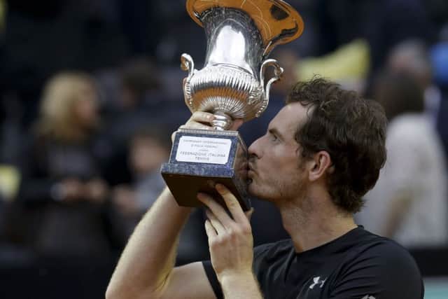 Andy Murray kisses the trophy after beating Novak Djokovic 6-3, 6-3 in the final match of the Italian Open. Picture: AP