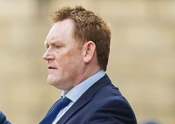 Livingston manager David Hopkin has agreed a new one-year deal