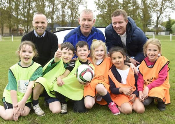 Michael Weir, Keith Wright and Gary Locke met pupils from Kings Park and St Lukes primary schools. Pic: Greg Macvean
