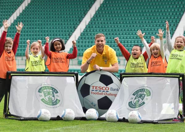 Niklas Gunnarsson met youngsters taking part in the Tesco Bank Football Challenge
