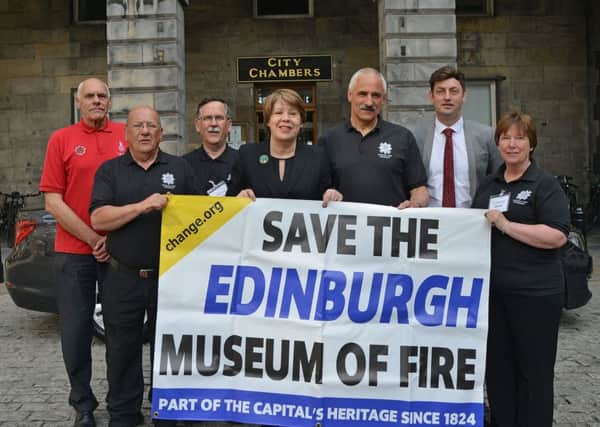 Fire museum representatives meet councillors Lesley Hinds and Cammy Day at the City Chambers. Picture: Jon Savage