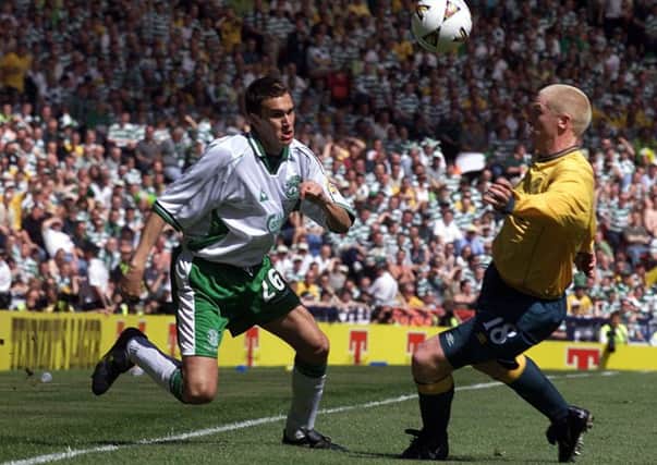 Ian Murray tries to beat Neil Lennon in the 2001 Cup final. Murray reckons that Celtic team was simply too talented for Hibs