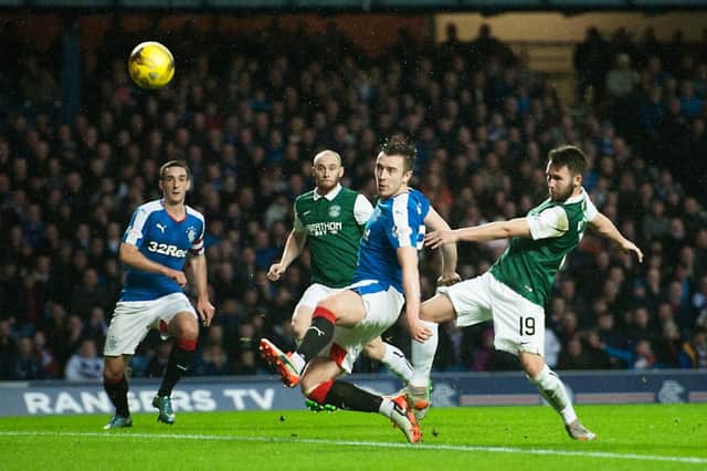 James Keatings and Danny Wilson tussle for the ball as David Gray and Jason Holt look on. Picture: John Devlin