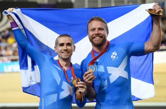Scotland's Neil Fachie (left) and pilot Craig MacClean win gold in the Men's Para-Sport Sprint B Tandem final. The Commonwealth Games provided a huge boost to tourism in Scotland. Picture: Jane Barlow.