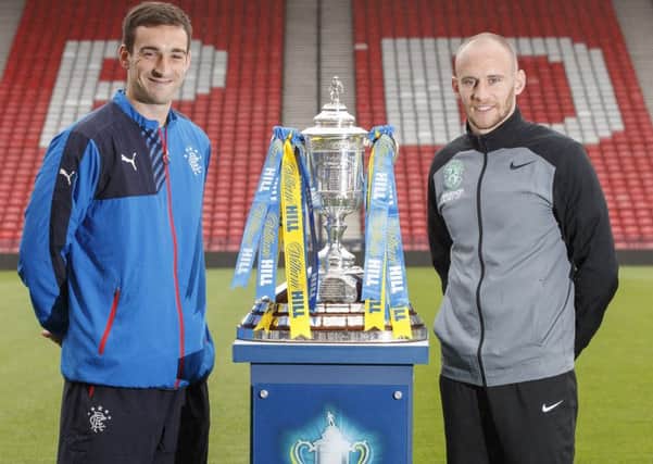 Captains pick: David Gray poses with the  Scottish Cup along with his counterpart at Rangers, Lee Wallace.
