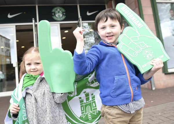 Matthew and Amelia  Morrison kitted out for the cup final. Picture: Greg Macvean