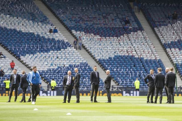 Rangers walk the pitch prior to the William Hill Scottish Cup Final. Picture PA
