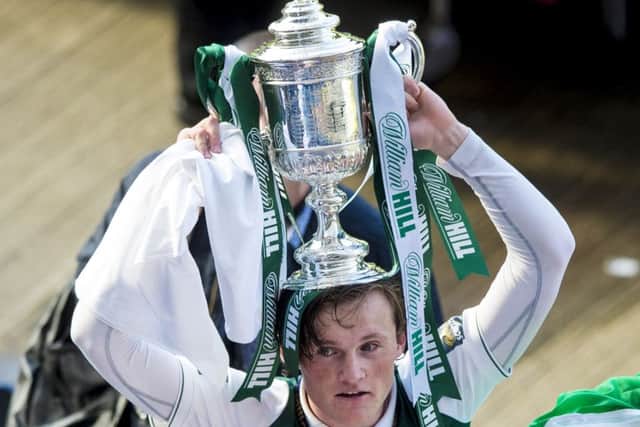 Liam Henderson with the trophy. Picture: SNS