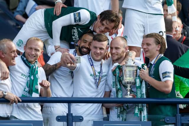 Hibs players bask in the glory of their Scottish Cup triumph. Pic: SNS