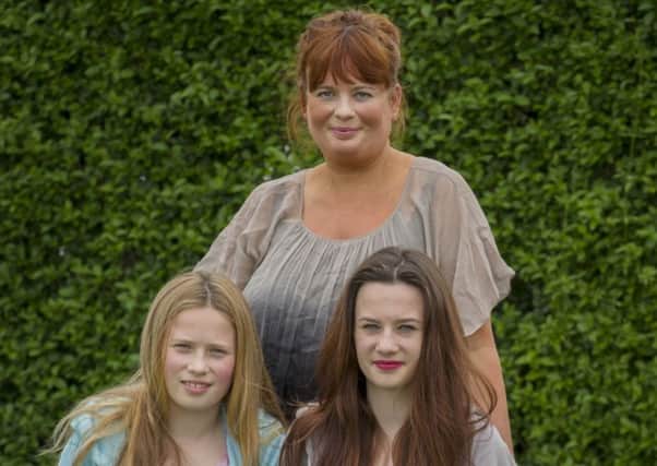 Jill Fulton, who lost her husband to drink driving, with their children Faye and Mia. Picture: Steven Scott Taylor