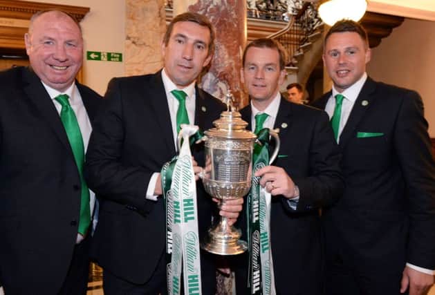 22/05/16 
  EDINBURGH  
  Hibernian manager Alan Stubbs celebrates with the Scottish Cup as he joins his coaching staff Andy Holden (left), John Doolan (2nd from right) and Goalkeeper coach Alan Combe (right)