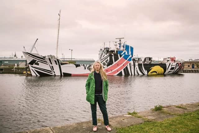 Ciara Phillips in front of her "Dazzle Ship". Picture: TSPL
