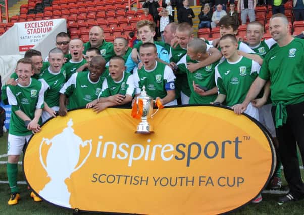 Edina Hibs 15s celebrate their win. The team had shaved their heads in support of Sean Hogg, a player with the clubs Under-14 side, who has been diagnosed with leukaemia. Pic: Craig Halkett