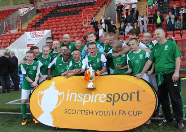 Edina Hibs 15s lift the Scottish Cup at Airdrie's Excelsior Stadium. Picture: supplied