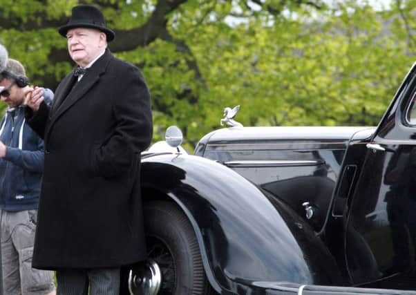 Brian Cox dressed as Winston Churchill filming scenes in Edinburgh for a new biopic titled Churchill. Pictures: SWNS