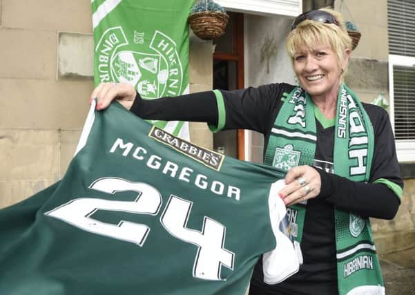 Darren McGregor's mum with the top he wore in Hibs' Scottish Cup final win. Picture: Greg Macvean