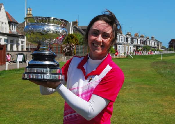 Clara Young with the Scottish Women's Amateur Championship trophy