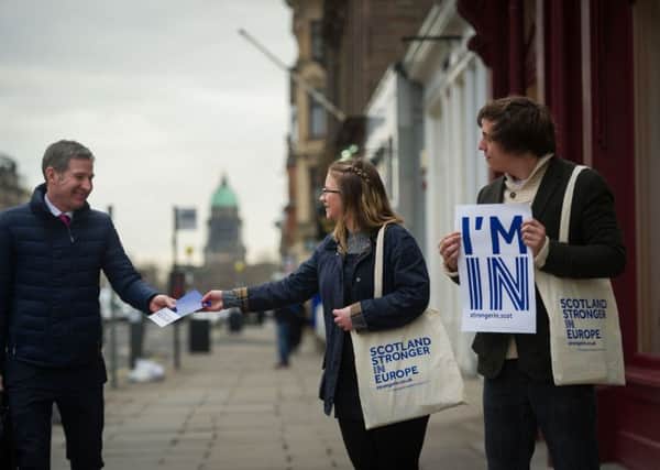 Scotland Stronger In Europe campaigners Charity Pierce and Johnney Rhodes hand out leaflets in Edinburgh. Picture: Steven Scott Taylor