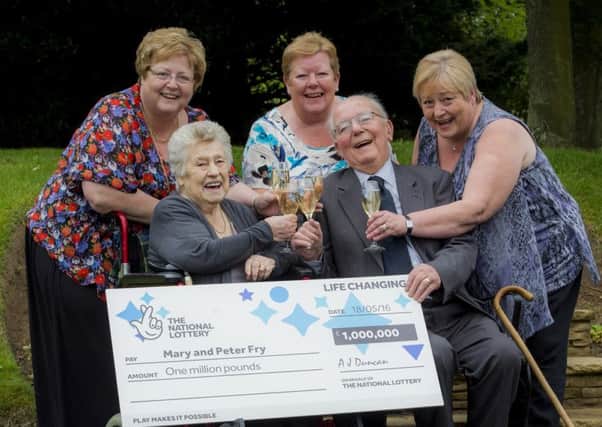 Peter and Mary Fry with daughters Margaret, Isobel and Janet, celebrate Lottery win
