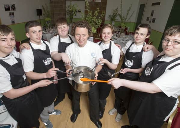 Tom Kitchin with youngsters from The Citadel. Picture: Jeff Holmes