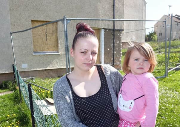 Siobhan Johnson and her daughter has been left in limbo after a car crashed into her house. Picture: Gordon Fraser