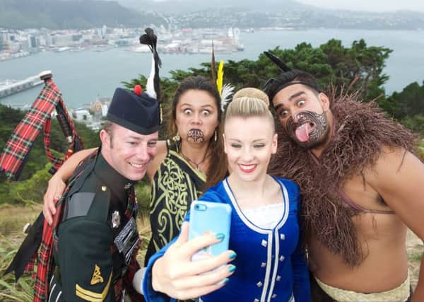 Touring Tattoo performers pose for a selfie. Picture: Rob McDougall