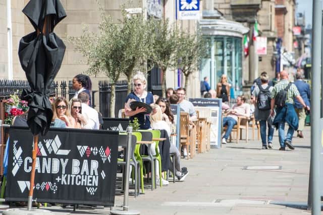 Al fresco dining in a sunny George Street. Picture: Ian Georgeson