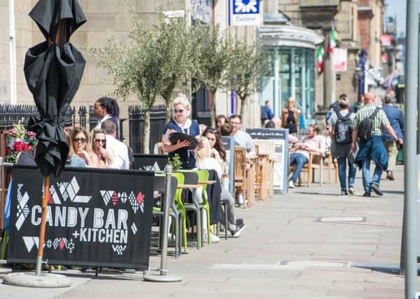 Al fresco dining in a sunny George Street. Picture: Ian Georgeson