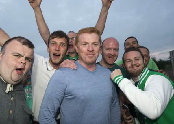 Happy Hibees: Fans welcome Neil Lennon at the clubs East Mains training centre