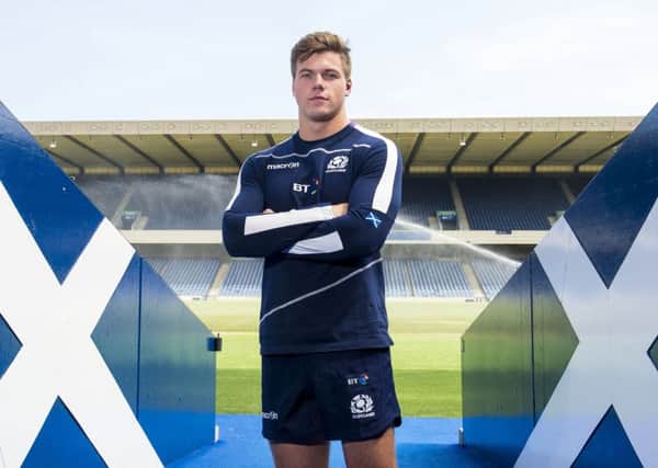 Huw Jones hopes to shake off a foot injury and play for Scotland in Japan. Pic: SNS