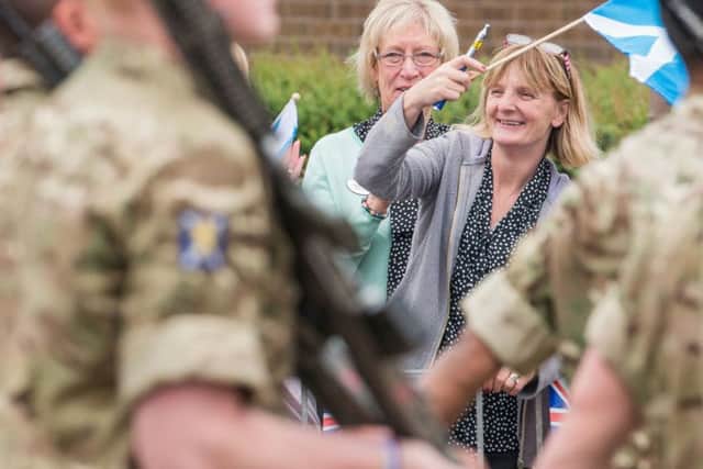 Hundreds gathered to cheer the returning soldiers. Picture: Ian Georgeson