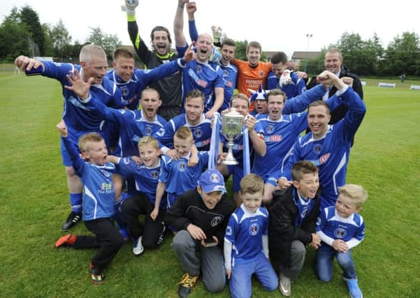 A jubilant Boness side celebrate their 5-1 East of 
Scotland Cup victory. Pic: Alan Murray