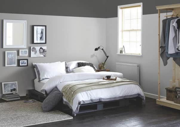 A room decorated in grey shades from the Colours range at B&Q. Photo: PA Photo/Handout