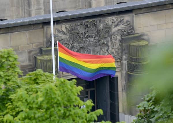 A rainbow flag flies at half-mast outside St Andrew's House on Regent Road. Picture: Julie Bull