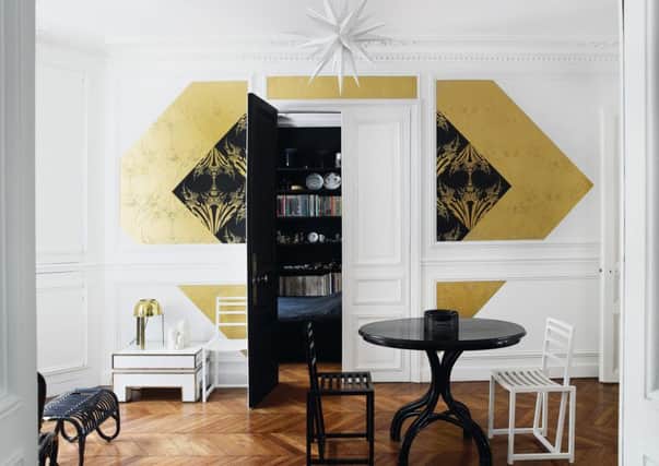 Gold and black make a contrast on a white wall, from an image in White Rooms, by David Harrison and Karen McCartney. Photo: PA Photo/Penguin Lantern