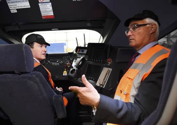 Chancellor George Osborne and predecessor Alistair Darling visit the Hitachi Rail Europe plant after attending a pro-Remain event. Picture: Getty