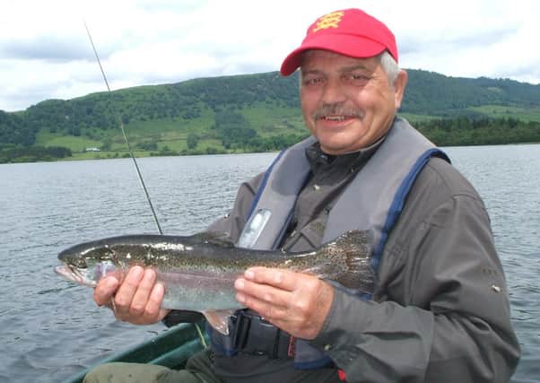 Jim Watt of Rutland with a 4lb rainbow taken on a cat booby on Lake of Menteith