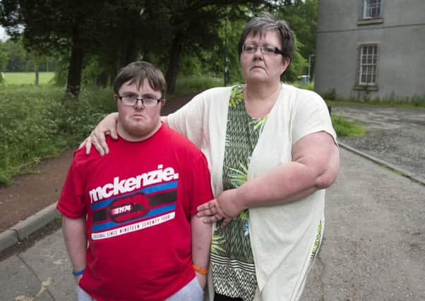 Louise McKenzie and her son Stephen at the Inch Community Education Centre, where he was left by a taxi driver. Picture: Ian Rutherford