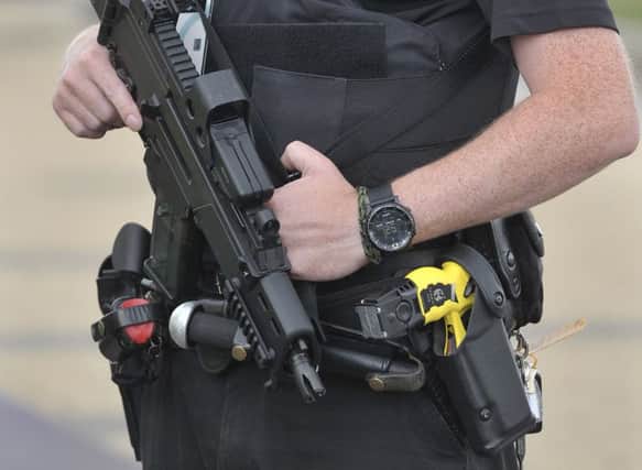 The number of armed officers will increase amid concerns over terror attacks. Picture: Ian Rutherford