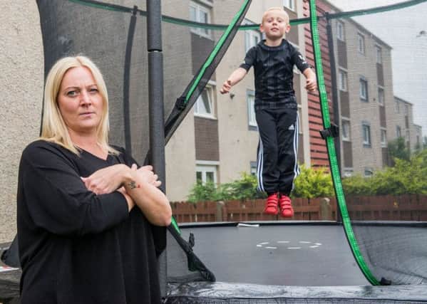 Tracey Hope's son Cole Hendry plays on the trampoline. Picture: Ian Georgeson