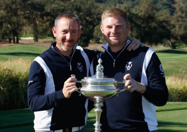 Graham Fox and Gareth Wright pose with the Llandudno Trophy at CordeValle, California