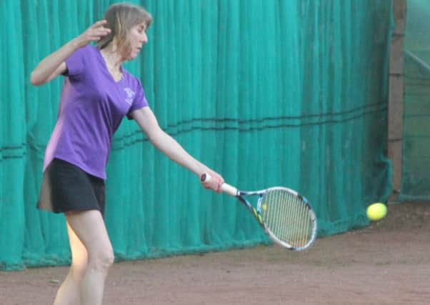 Sam Fearnley in action for Dalkeith Tennis Club