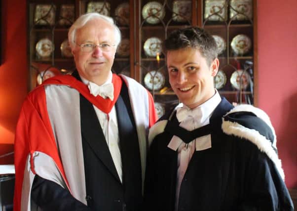 Gregor McMillan receives his Larmor Award from the Master of St Johns College, Professor Chris Dobson. Picture: contributed