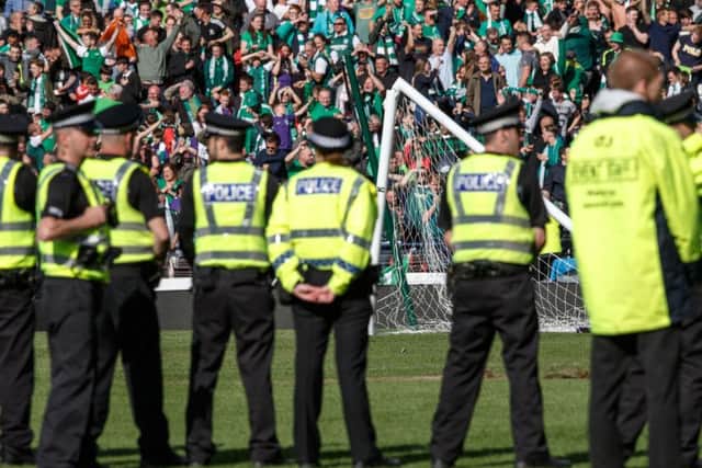 The Scottish Cup Final was marred by violence and a pitch invasion. Picture: Robert Perry
