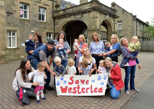 Campaigners outside Westerlea Early Years group. Picture: Jon Savage